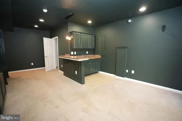 a bathroom with a sink and mirror