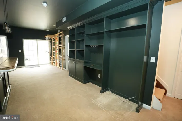 a room with closet and a window