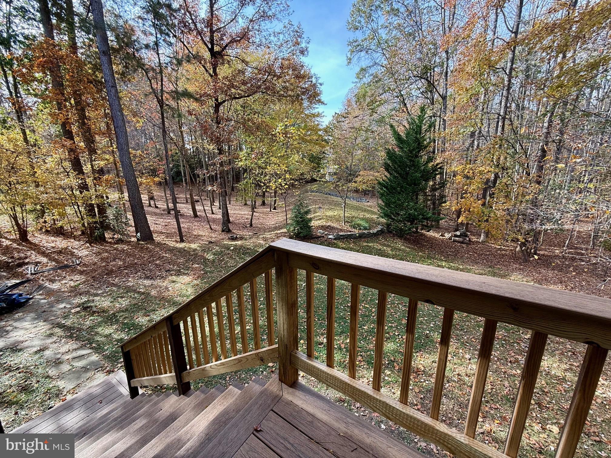 23293 Misty Pond Lane California, MD 20619 - Photo 35 of 35 a view of a wooden street from a balcony