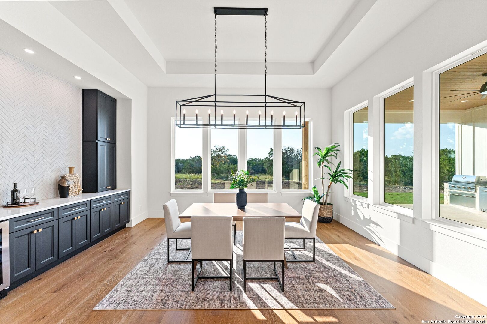 1202 Cielo Rio Drive Pipe Creek, TX 78063 - Photo 15 of 54 a view of a livingroom with furniture window and wooden floor