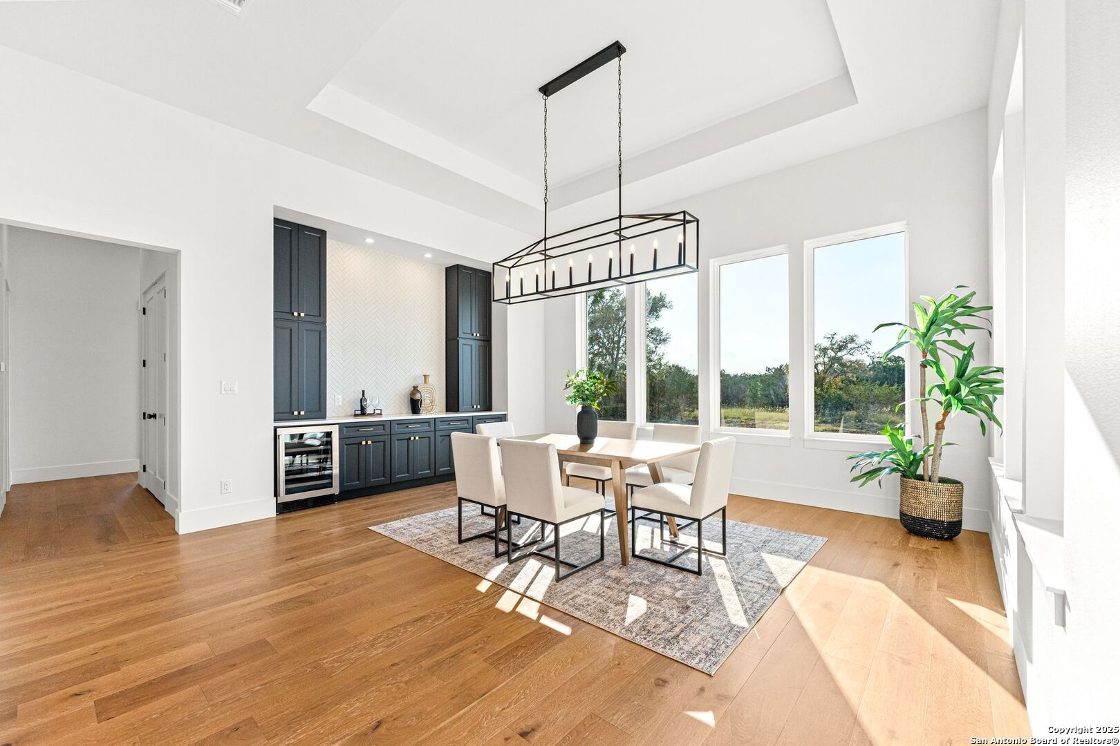 1202 Cielo Rio Drive Pipe Creek, TX 78063 - Photo 16 of 54 a living room with furniture or window and a wooden floor