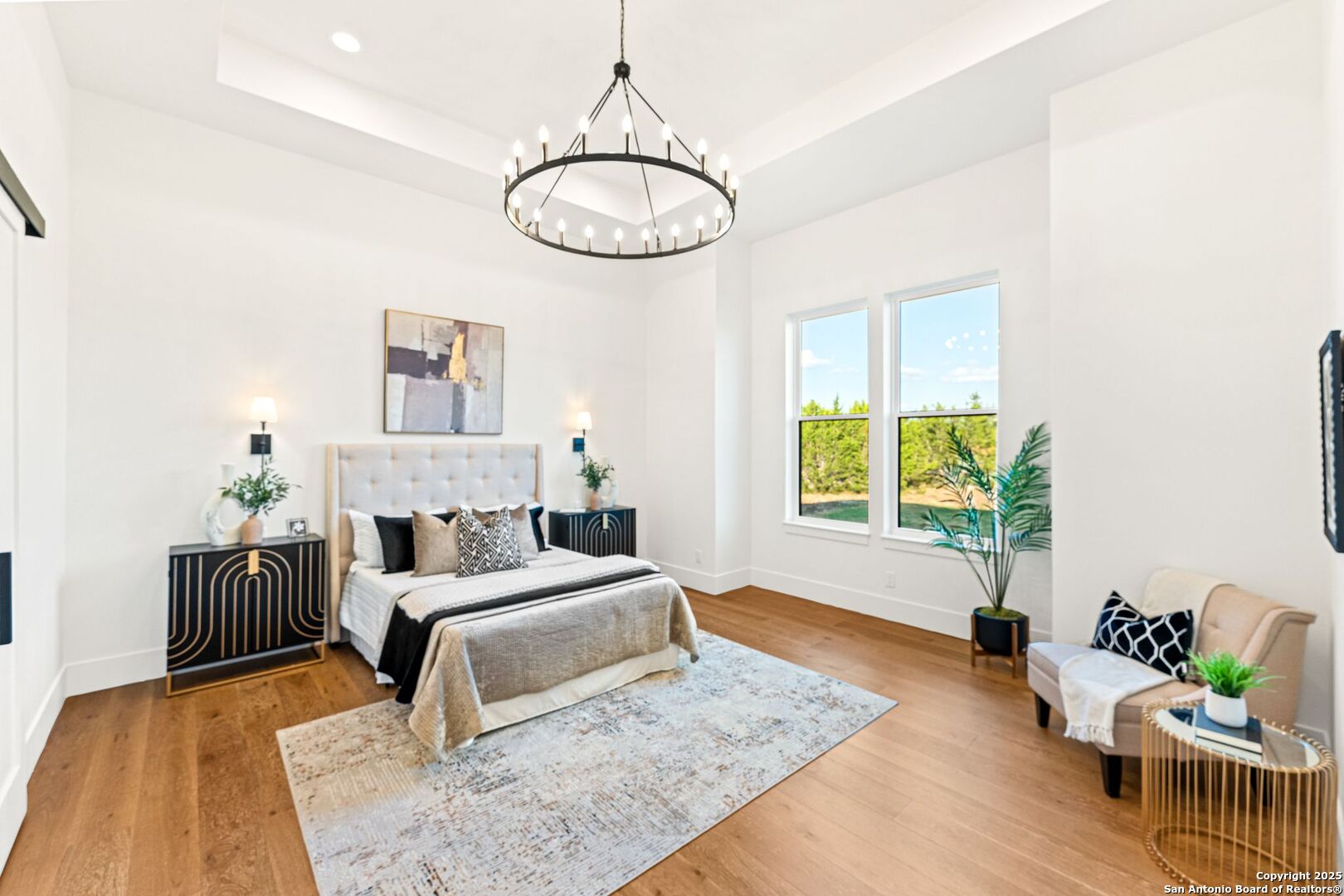 1202 Cielo Rio Drive Pipe Creek, TX 78063 - Photo 22 of 54 a living room with furniture potted plant and a large window