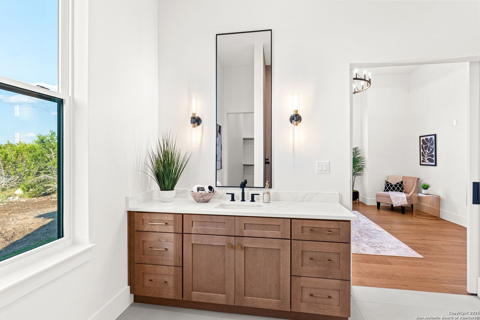 1202 Cielo Rio Drive Pipe Creek, TX 78063 - Photo 31 of 54 a bathroom with a sink and a mirror