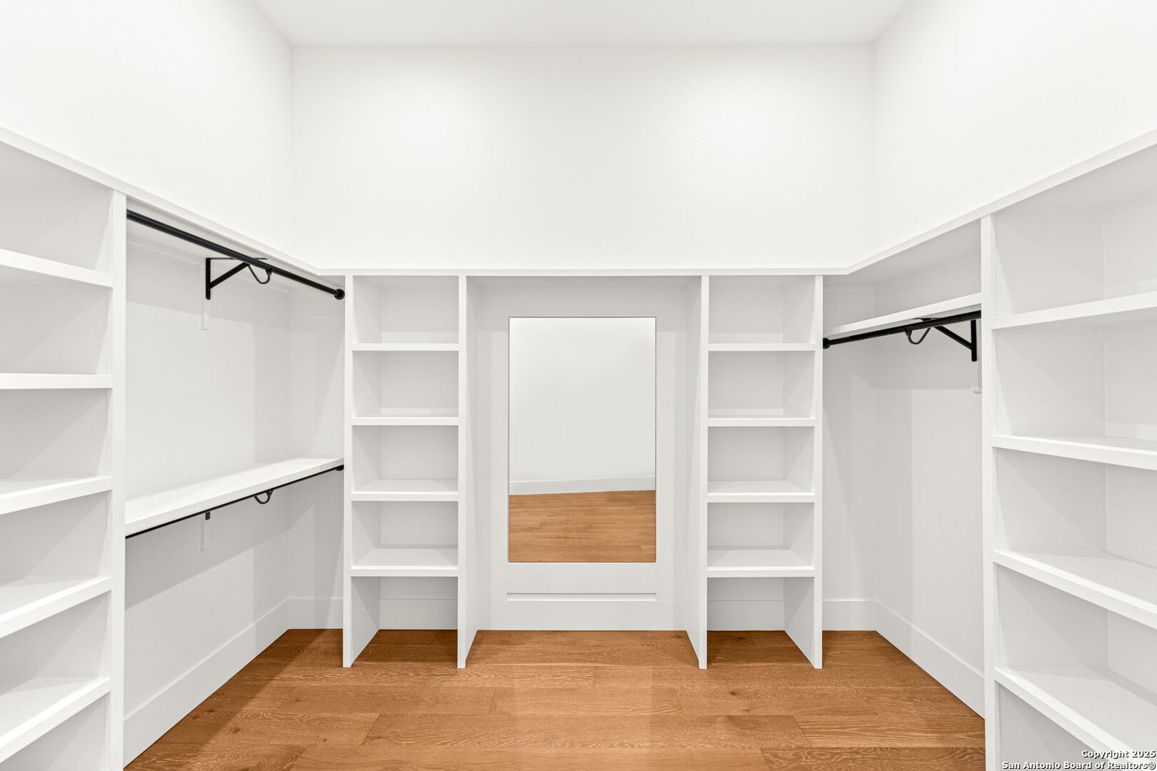 1202 Cielo Rio Drive Pipe Creek, TX 78063 - Photo 32 of 54 a view of an empty room with empty racks