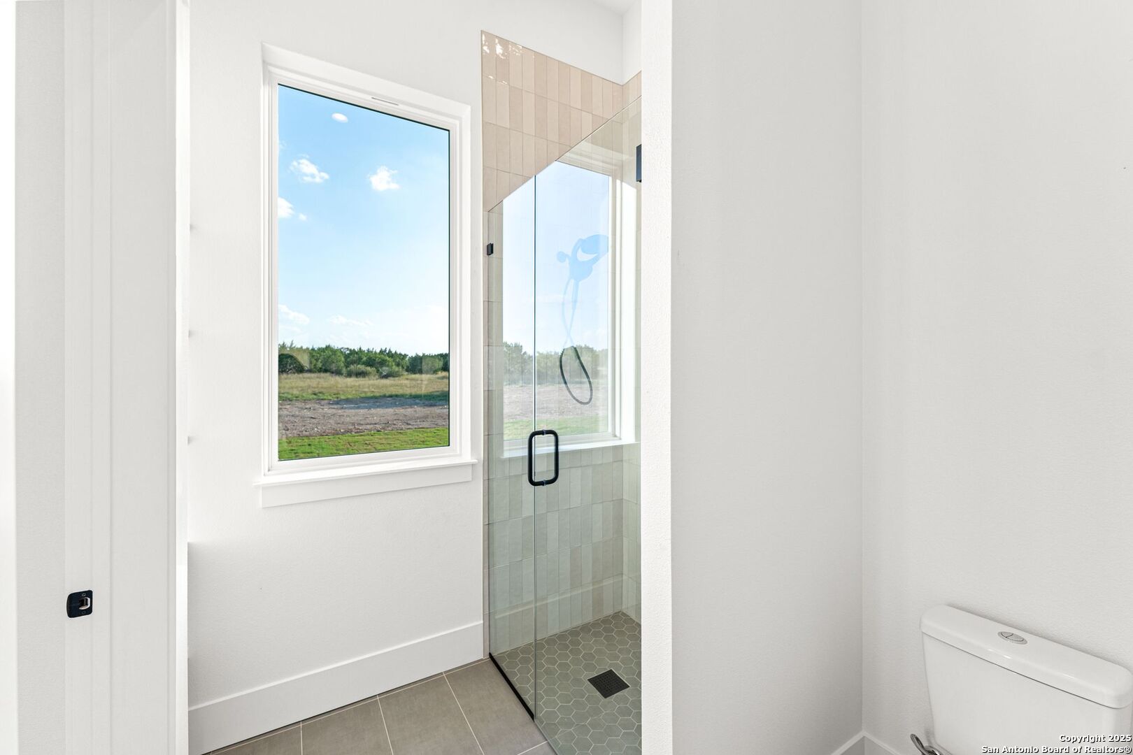 1202 Cielo Rio Drive Pipe Creek, TX 78063 - Photo 42 of 54 a bathroom with a shower