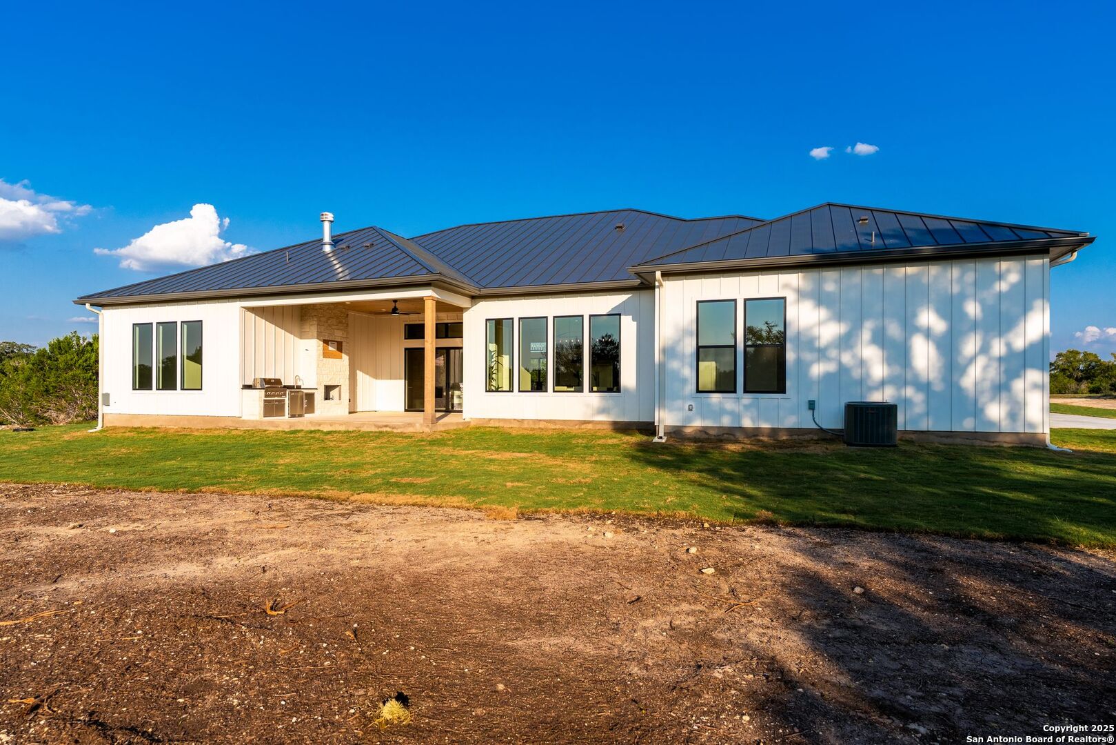 1202 Cielo Rio Drive Pipe Creek, TX 78063 - Photo 49 of 54 a view of a house with a yard