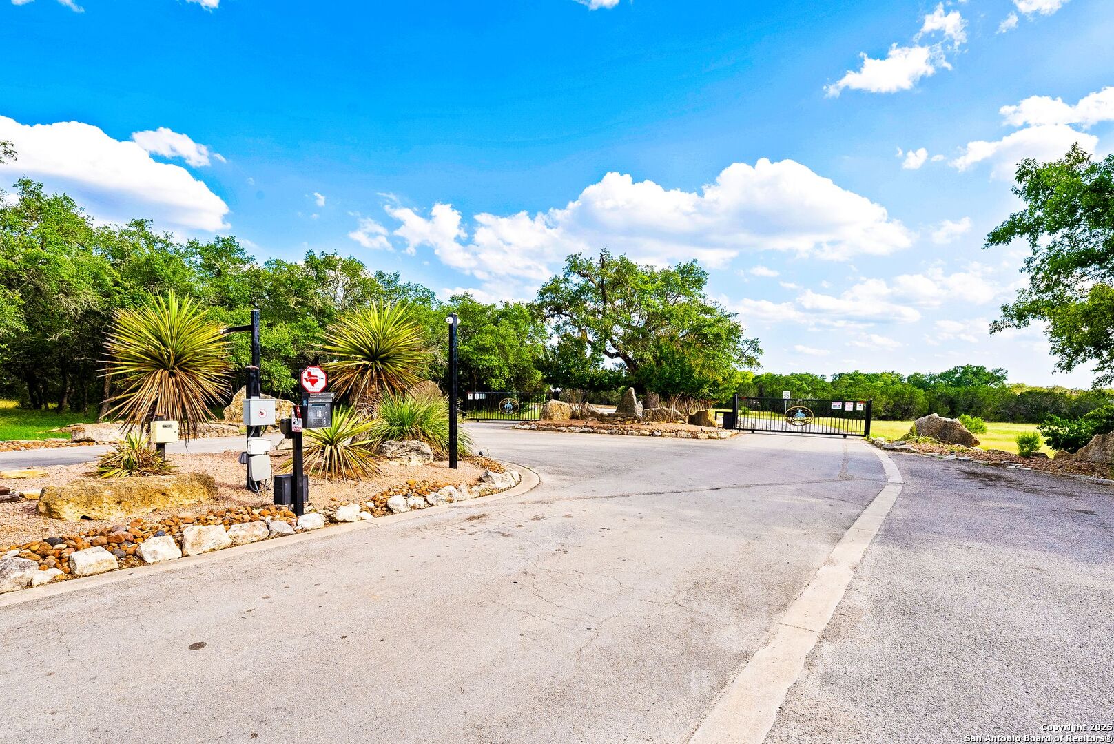 1202 Cielo Rio Drive Pipe Creek, TX 78063 - Photo 54 of 54 a view of a terrace with a garden and mountain view