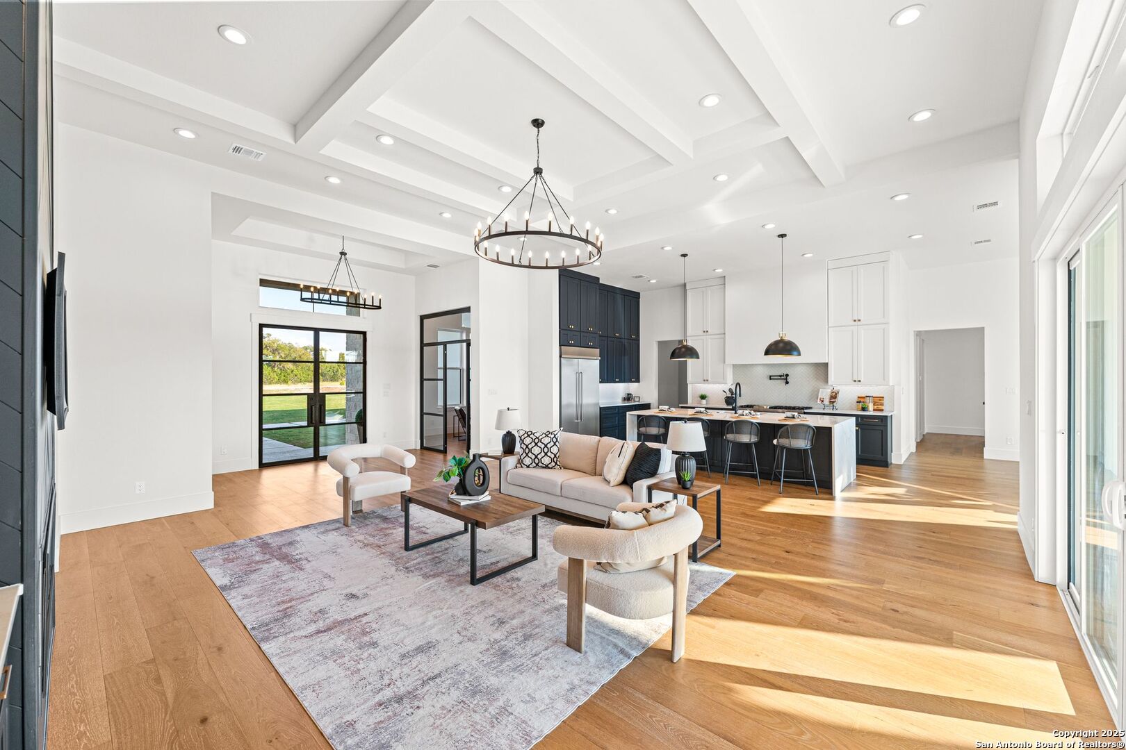 1202 Cielo Rio Drive Pipe Creek, TX 78063 - Photo 9 of 54 a living room with lots of furniture and kitchen view