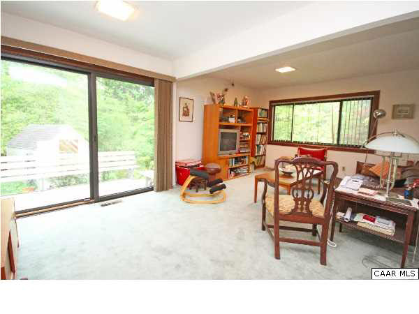 1620 Keith Valley Road Charlottesville, VA 22901 - Photo 15 of 24 a living room filled with furniture and a large window