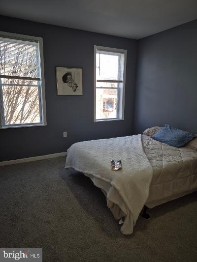 2903 Jefferson Street Baltimore, MD 21205 - Photo 18 of 48 a bedroom with a bed and a window