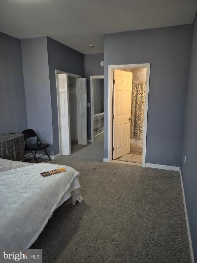 2903 Jefferson Street Baltimore, MD 21205 - Photo 20 of 48 a bedroom with a bed and a window