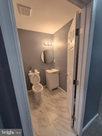 a bathroom with a toilet