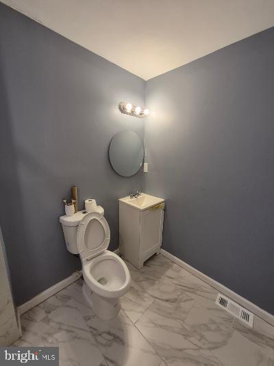 2903 Jefferson Street Baltimore, MD 21205 - Photo 30 of 48 a bathroom with a toilet