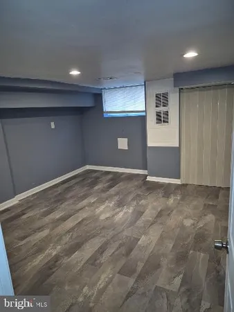 a bathroom with a shower and a bath tub