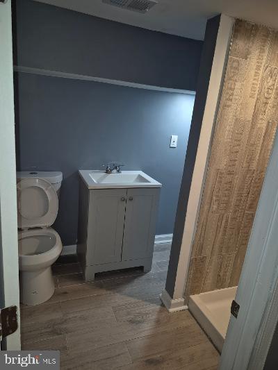 2903 Jefferson Street Baltimore, MD 21205 - Photo 37 of 48 a bathroom with a sink and toilet