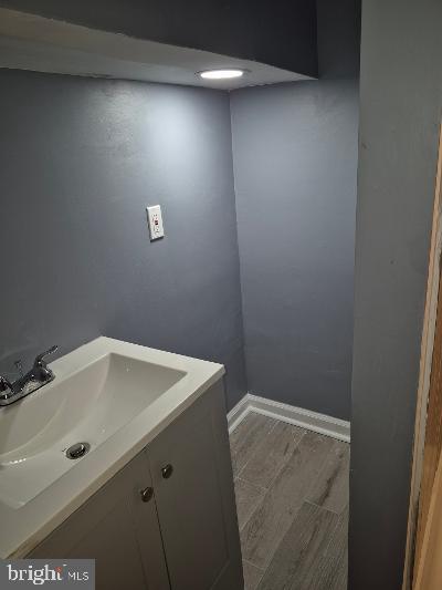 2903 Jefferson Street Baltimore, MD 21205 - Photo 38 of 48 a bathroom with a sink and vanity