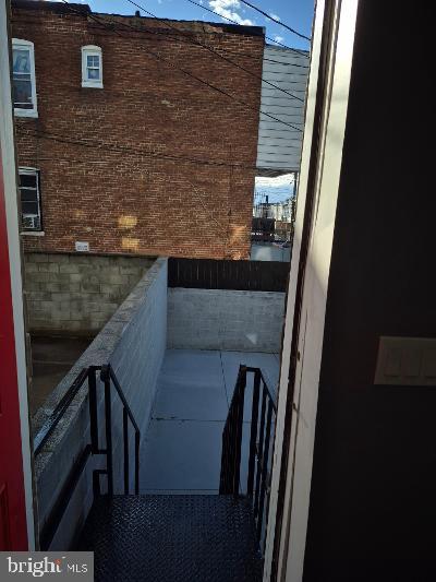 2903 Jefferson Street Baltimore, MD 21205 - Photo 46 of 48 a view of balcony door and wooden floor