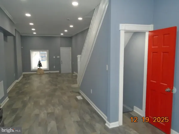 a utility room with granite countertop a sink a washer and dryer
