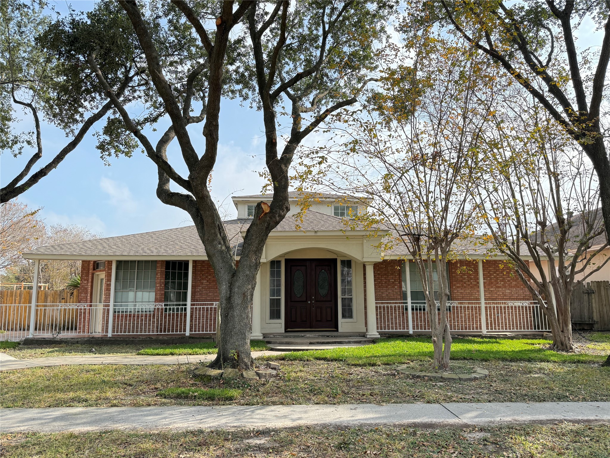 11346 Old Telegraph Road Houston, TX 77067 - Photo 1 of 20 a front view of a house with garden