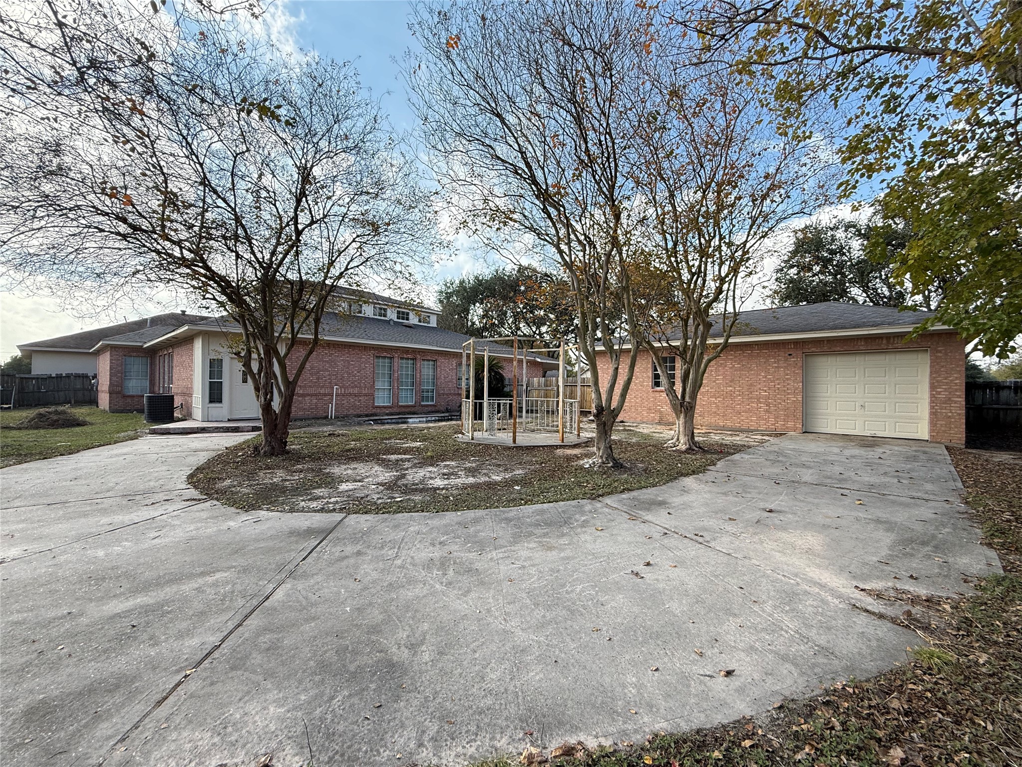11346 Old Telegraph Road Houston, TX 77067 - Photo 20 of 20 a view of a yard with a house and a tree