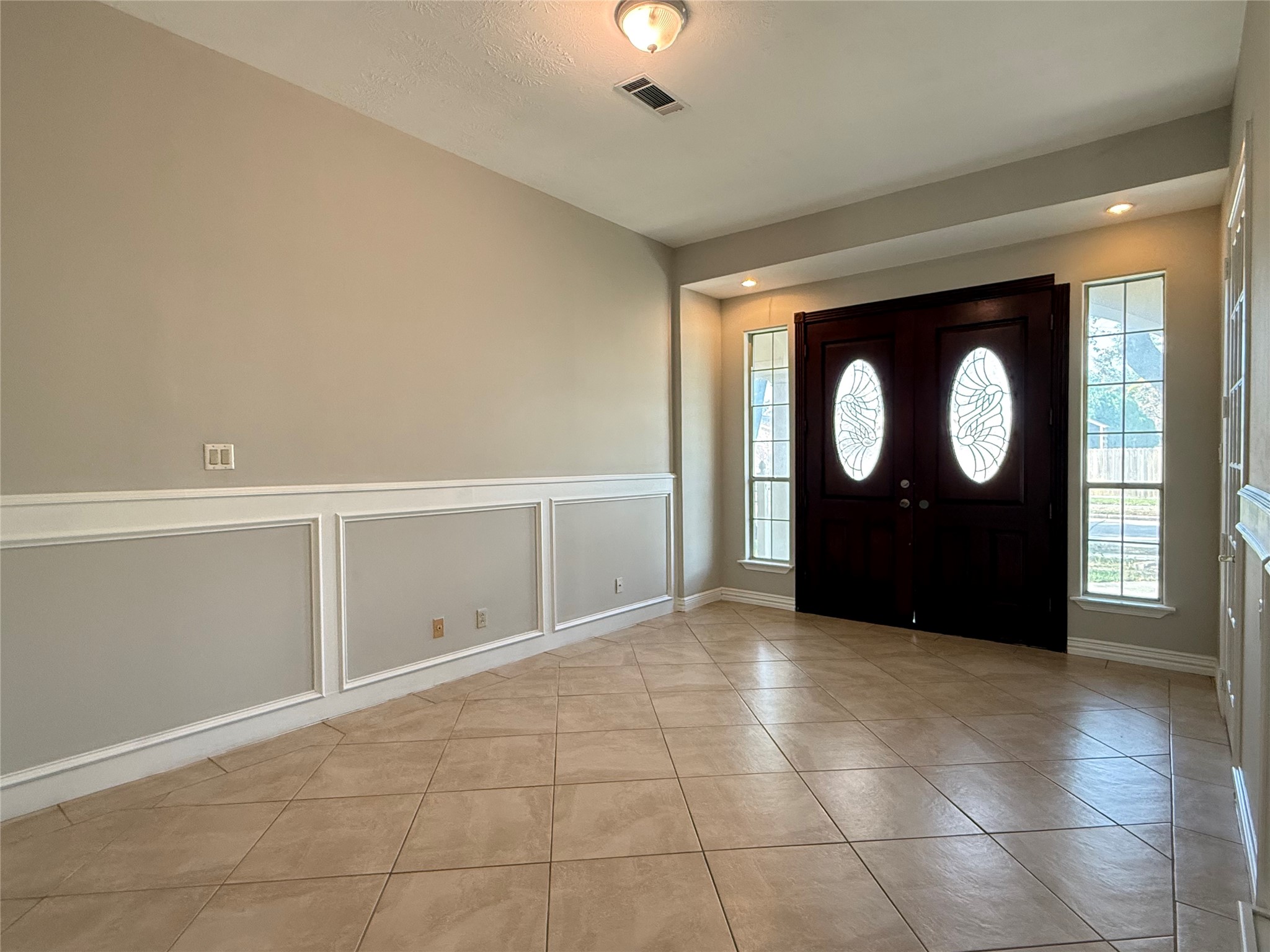 11346 Old Telegraph Road Houston, TX 77067 - Photo 3 of 20 a view of a livingroom with a staircase