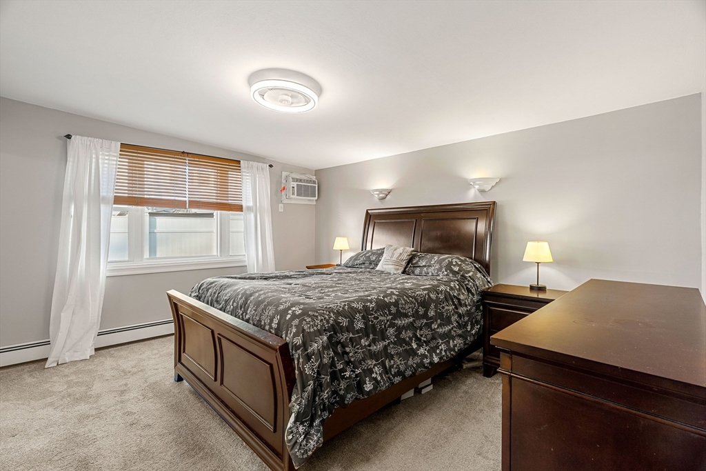 3 Adams Avenue Methuen, MA 01844 - Photo 19 of 37 a bedroom with a bed and window