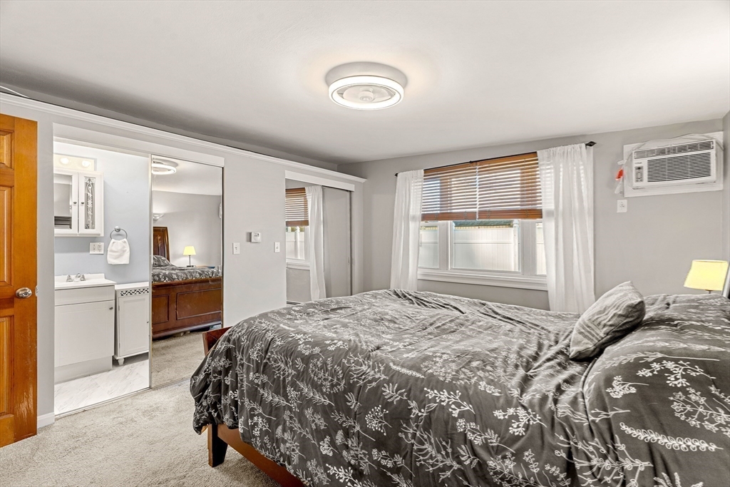 3 Adams Avenue Methuen, MA 01844 - Photo 21 of 37 a bedroom with a large bed and a dresser