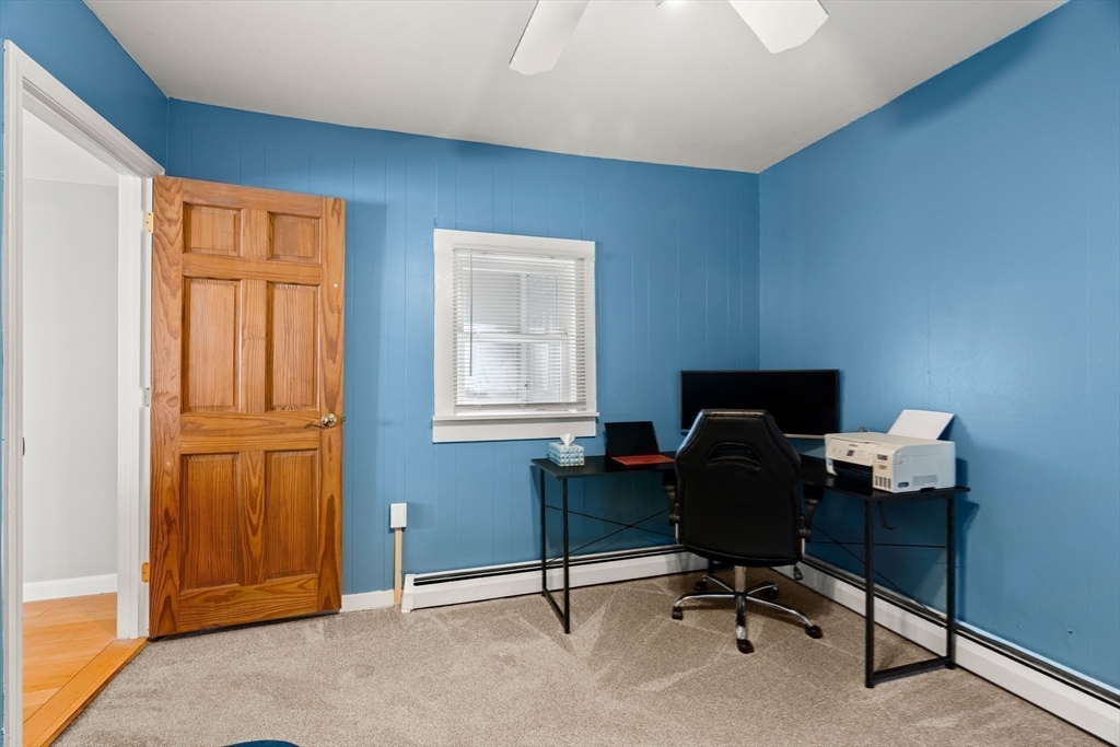 3 Adams Avenue Methuen, MA 01844 - Photo 27 of 37 a view of a workspace with furniture and a window