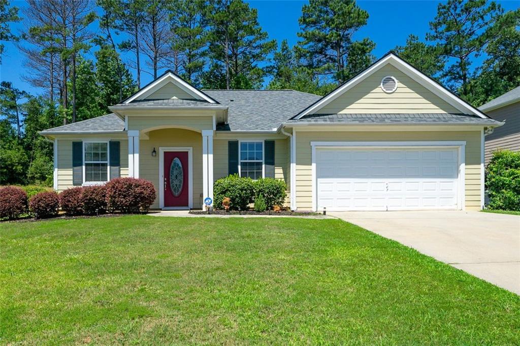 6529 Waterford Street Southwest Atlanta, GA 30331 - Photo 1 of 1 a front view of a house with a yard