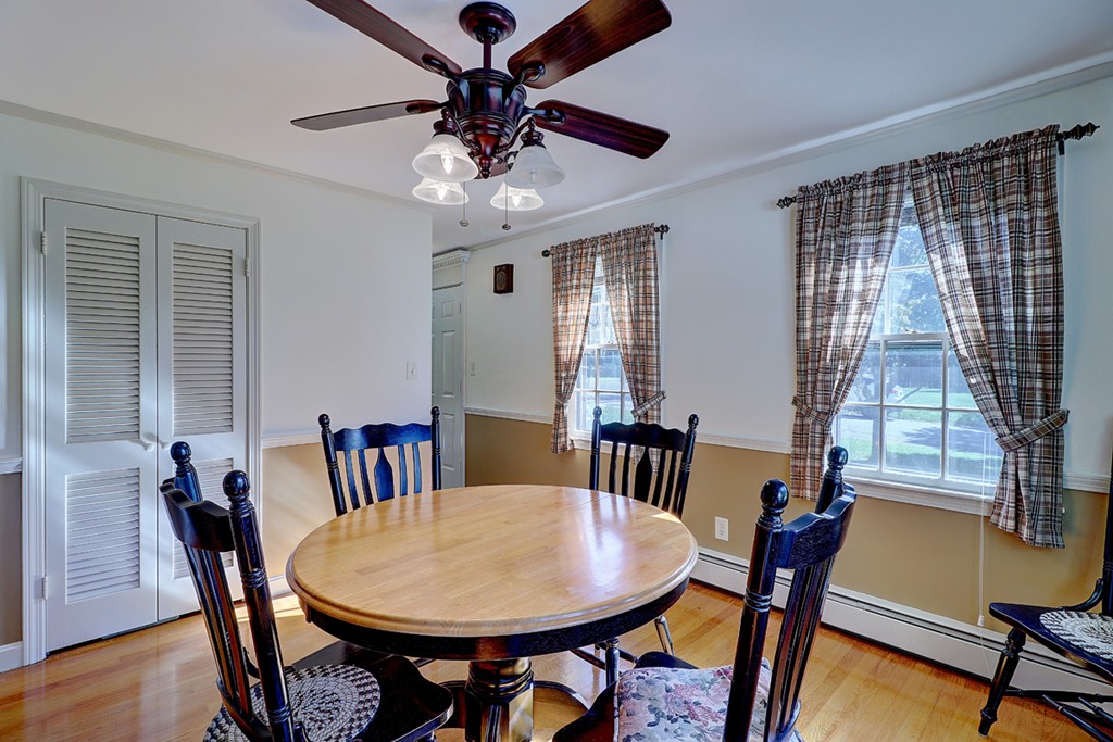 70 Linden Road Seekonk, MA 02771 - Photo 13 of 25 a view of a dining room with furniture window and wooden floor