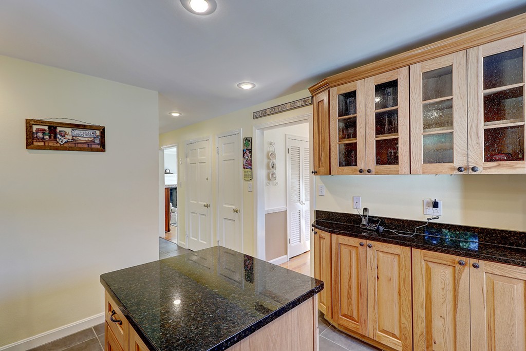 70 Linden Road Seekonk, MA 02771 - Photo 17 of 25 a kitchen with stainless steel appliances granite countertop a sink and a granite counter tops