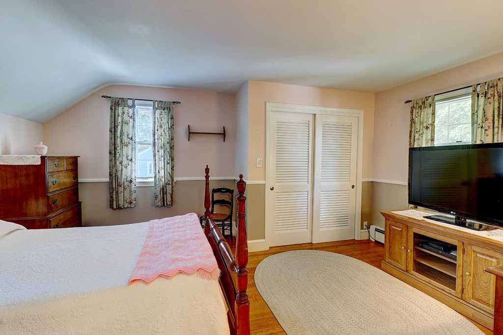 70 Linden Road Seekonk, MA 02771 - Photo 20 of 25 a bedroom with furniture and a flat screen tv