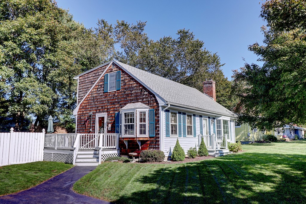 70 Linden Road Seekonk, MA 02771 - Photo 2 of 25 a front view of a house with a yard table and chairs