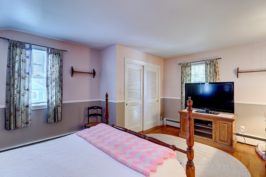 70 Linden Road Seekonk, MA 02771 - Photo 21 of 25 a bedroom with a bed and a flat screen tv
