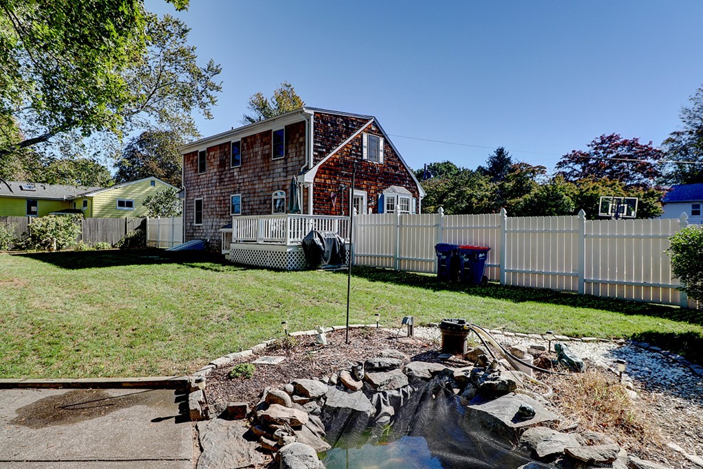 70 Linden Road Seekonk, MA 02771 - Photo 4 of 25 a view of a house with a garden