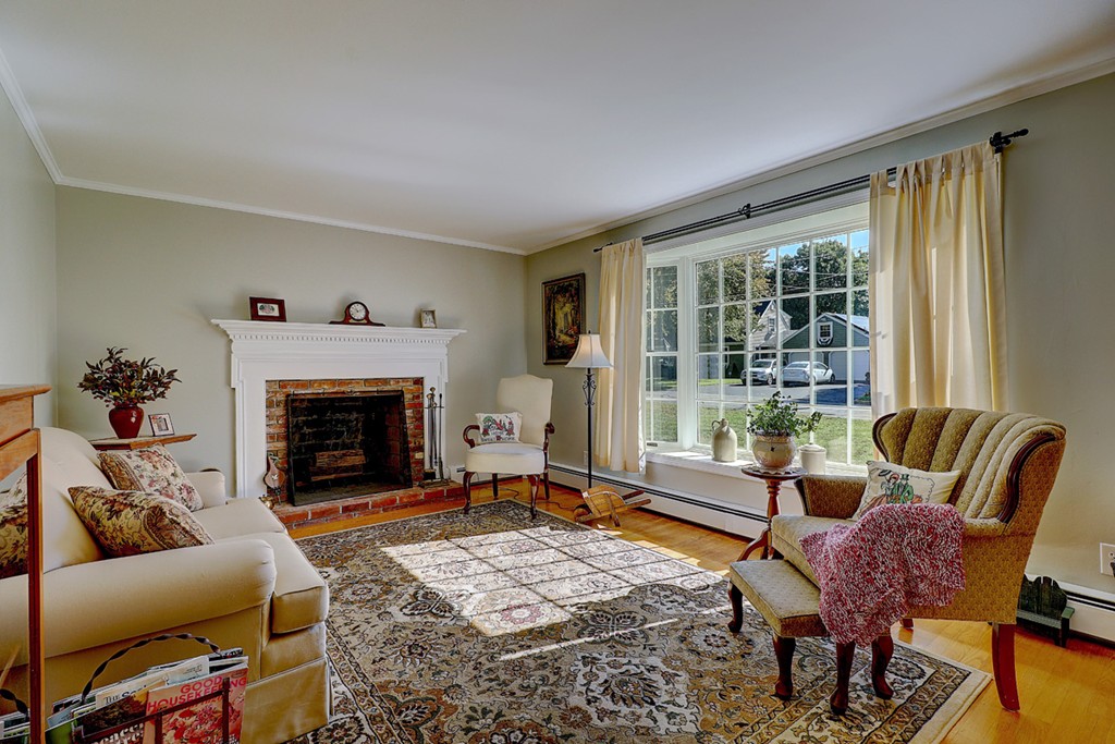 70 Linden Road Seekonk, MA 02771 - Photo 8 of 25 a living room with furniture and a fireplace