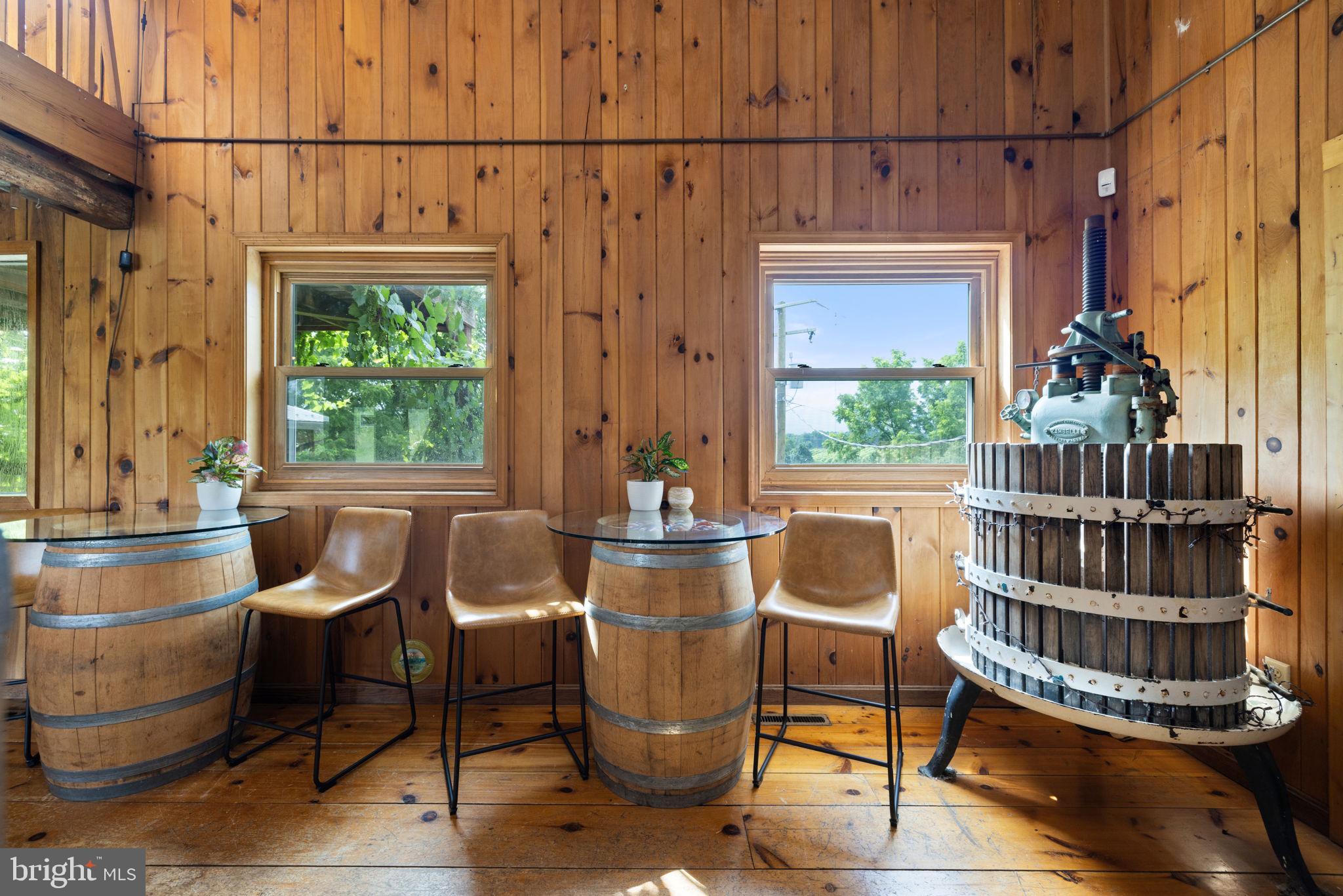3659 South Ox Road Edinburg, VA 22824 - Photo 11 of 66 a dining room with furniture window and wooden floor