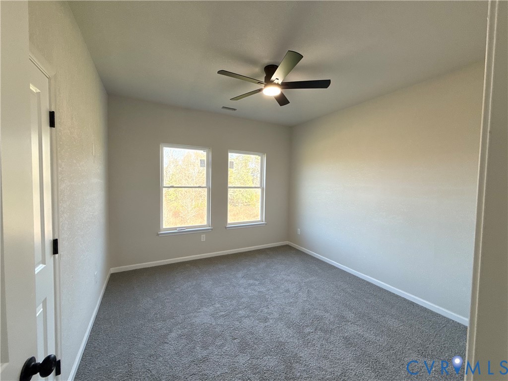 63 Hatcher Road Powhatan, VA 23139 - Photo 11 of 13 a view of an empty room with a window