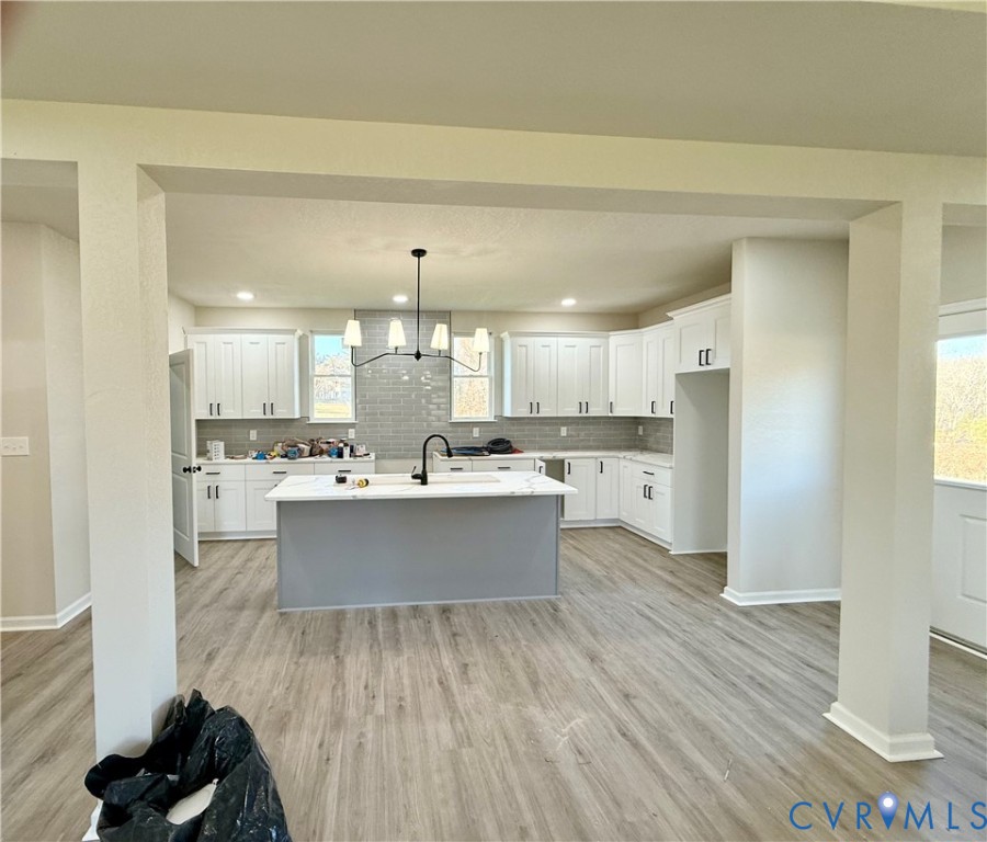 63 Hatcher Road Powhatan, VA 23139 - Photo 4 of 13 a large kitchen with a lot of counter space and wooden floor
