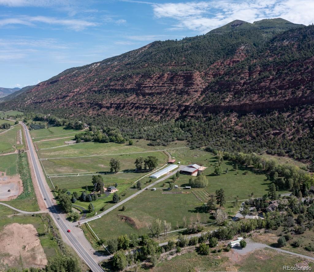 131 Citadel, Unit RESIDE Ridgway, CO 81432 - Photo 11 of 25 a view of a lake with a mountain