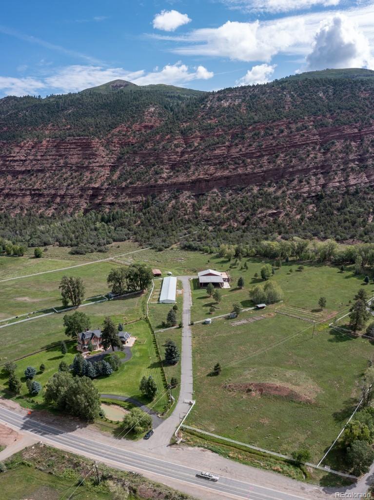 131 Citadel, Unit RESIDE Ridgway, CO 81432 - Photo 15 of 25 a view of a lake in middle of the town
