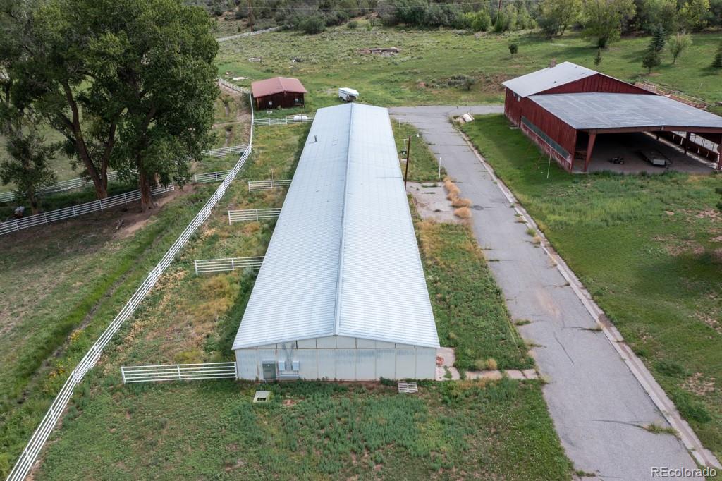131 Citadel, Unit RESIDE Ridgway, CO 81432 - Photo 18 of 25 a view of a backyard with sitting area