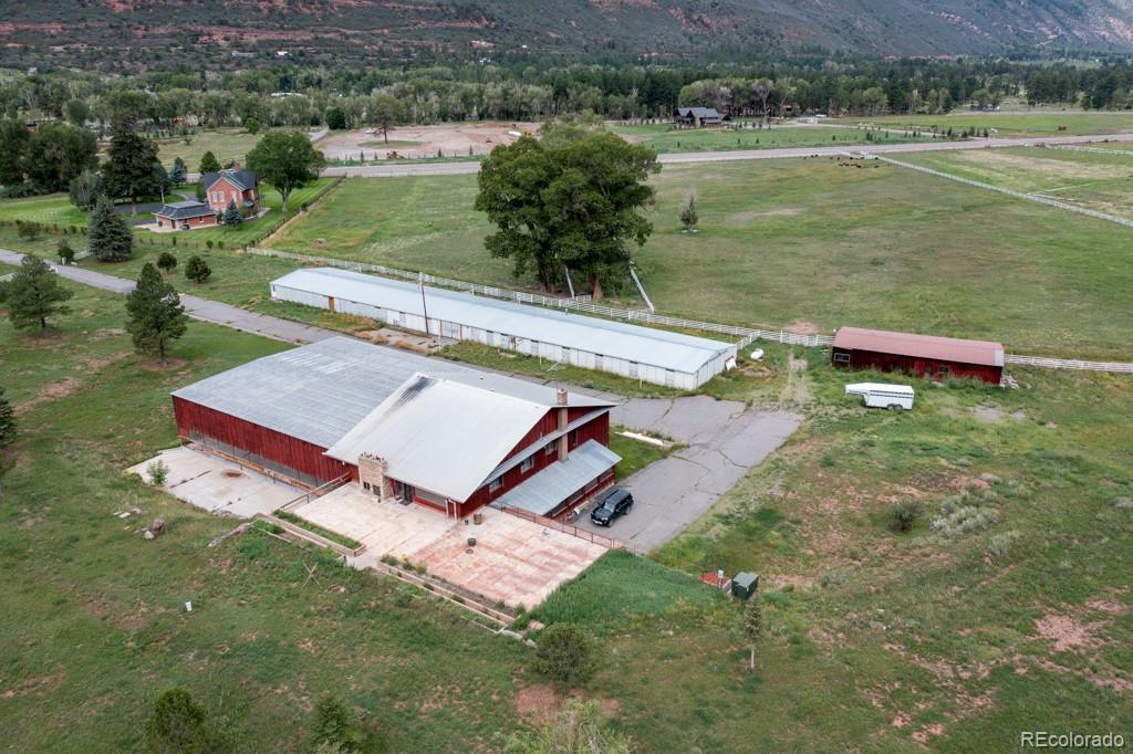 131 Citadel, Unit RESIDE Ridgway, CO 81432 - Photo 22 of 25 a view of a lake with a yard