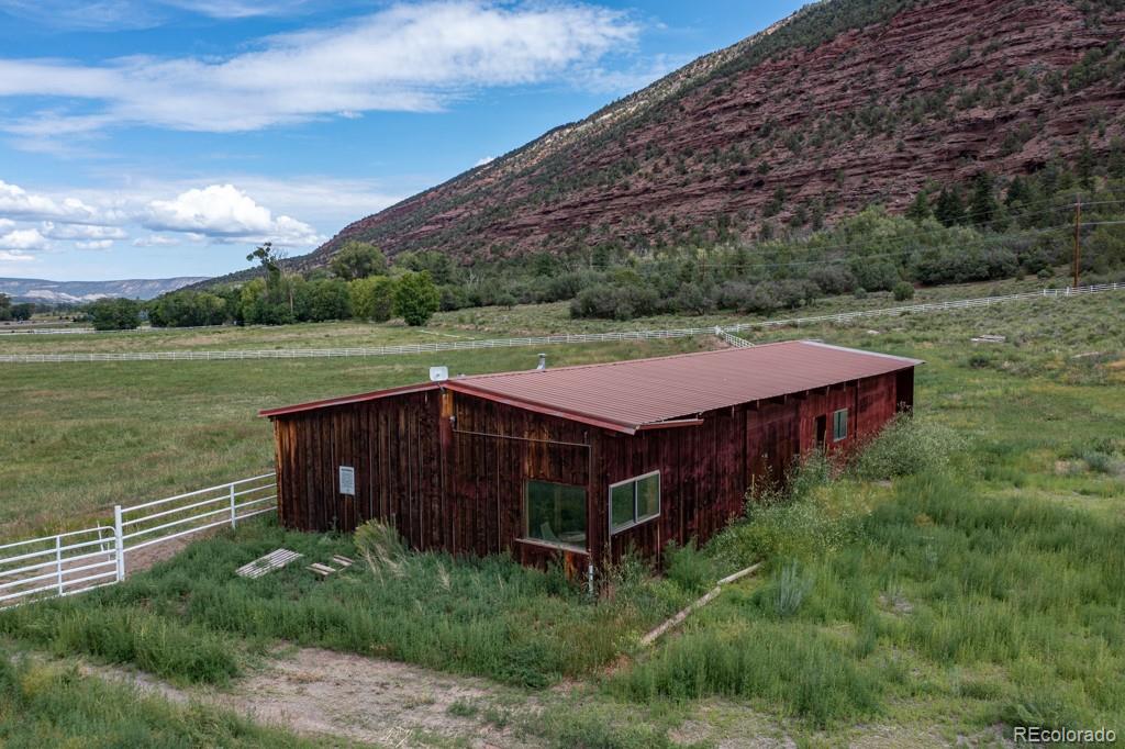 131 Citadel, Unit RESIDE Ridgway, CO 81432 - Photo 3 of 25 a aerial view of a house with a yard