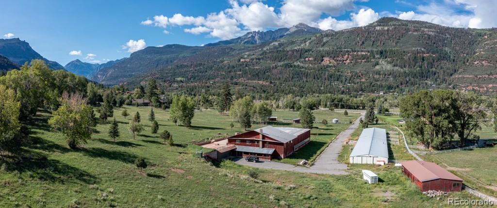 131 Citadel, Unit RESIDE Ridgway, CO 81432 - Photo 4 of 25 a view of a golf course with chairs