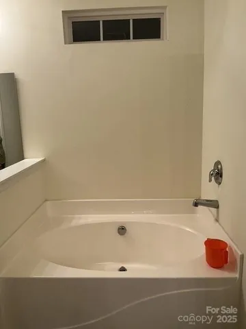 a bathroom with a bathtub