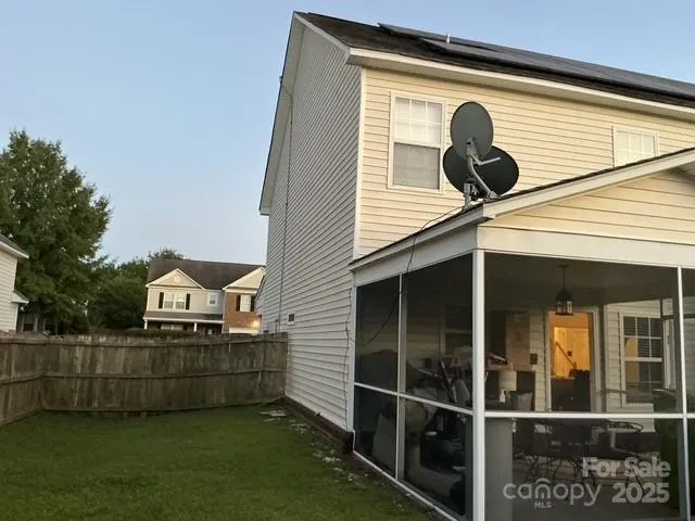 a front view of a house with a garage