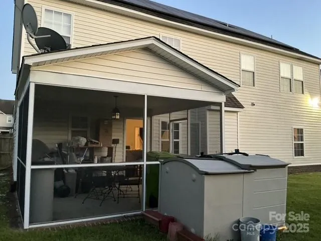 a view of house with outdoor space