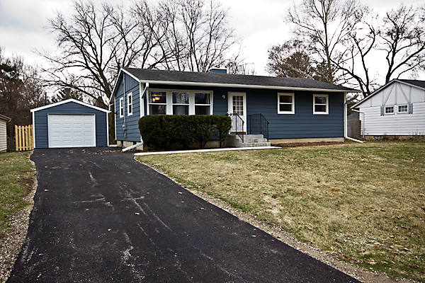 426 Thoria Road Batavia, IL 60510 - Photo 1 of 8 a front view of a house with yard
