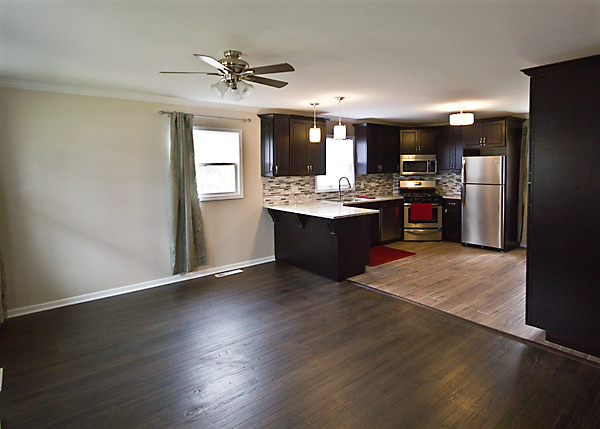 426 Thoria Road Batavia, IL 60510 - Photo 2 of 8 a large kitchen with stainless steel appliances granite countertop a stove refrigerator and a sink